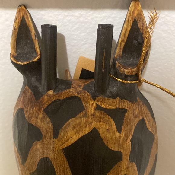 Hand Painted Wooden African Animal Wall Decor
Giraffe Mask Made in Indonesia - Picture 4 of 12
